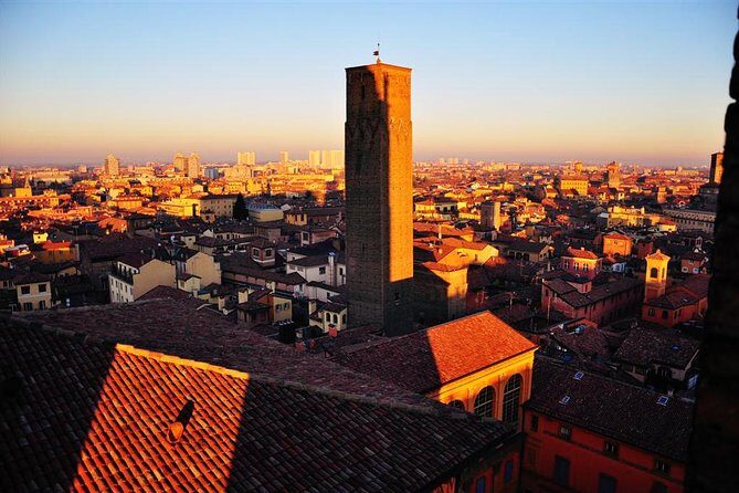 Bologna By Night Walking Tour - Piazza Santo Stefano: the light-filled evening pause