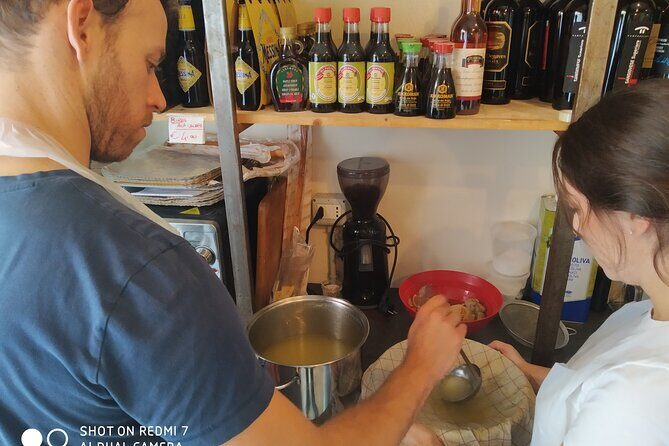 Bolognese Cooking Class in a Unique Central Location - Lunch at the table: wine, what you made, and a real Bologna pause