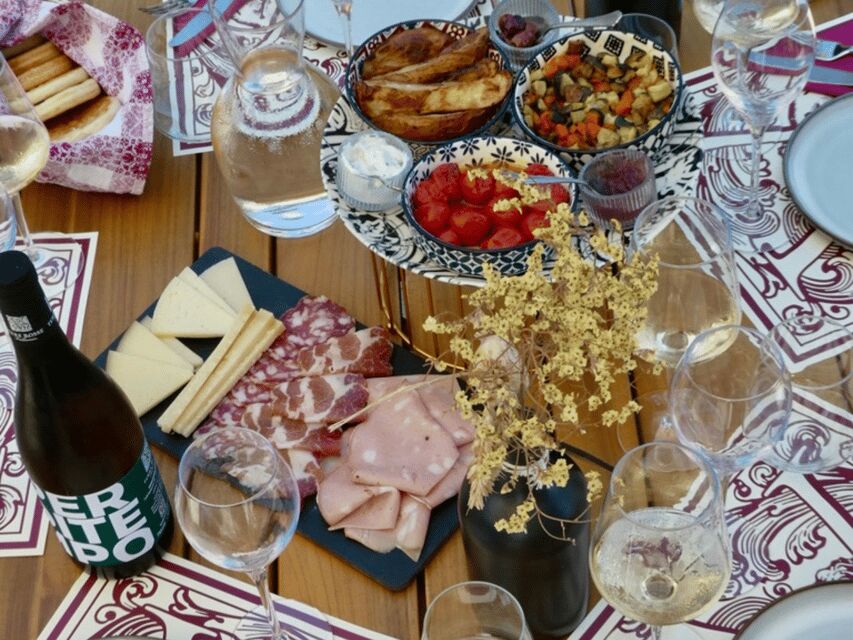 Boutique Winery Tour with Wine Tasting & Food in Bologna - Inside Cantina Terre Rosse Vallania: vineyards, terroir, and how wine is made