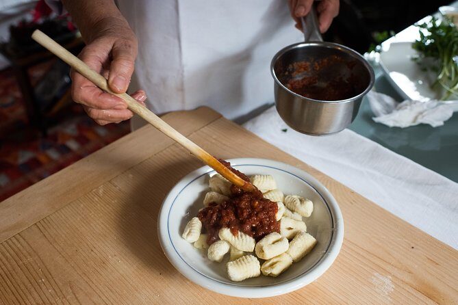 Cesarine: Market Tour & Cooking Class at Local's Home in Lucca - Lucca Market Tour Meets a Home Kitchen