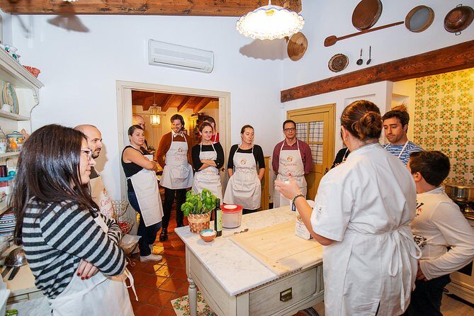 Cesarine: Market Tour & Cooking Class at Local's Home in Lucca - Market Stops: How Herbs and Ingredients Change Everything