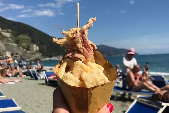 Cinque Terre Day Trips From Florence Sunshine and Discovery - Finding the group in Florence: Piazzale Montelungo and those orange jackets