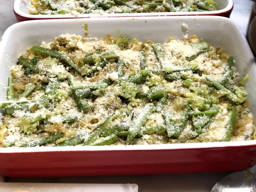 Cortona: Pasta and Pizza Cooking Class - Eating outdoors with the sunset over Tuscan hills