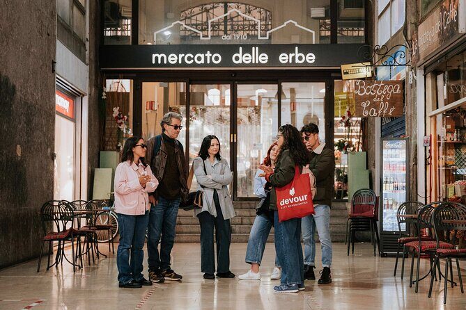Devour Bologna Tastes & Traditions Food Tour with Market Visit - Mercato delle Erbe: Cheese Lessons and Mortadella Panini