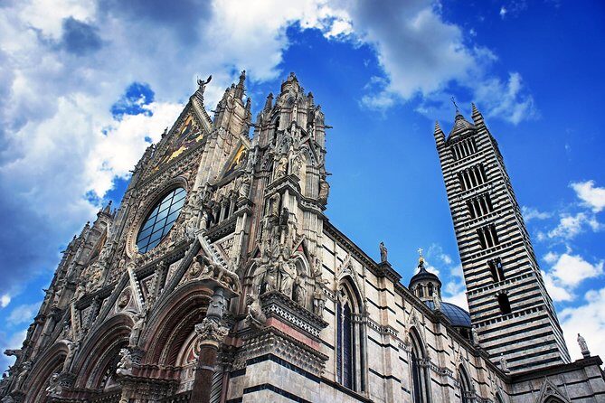 Discover Siena: Guided Walking Tour and Cathedral Visit - Palazzo Tolomei: Gothic power in the middle of it all