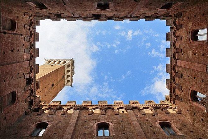 Discover the Medieval Charm of Siena on a Private Walking Tour - Palazzo Tolomei: A Medieval Private Building With Legend-Based Symbolism