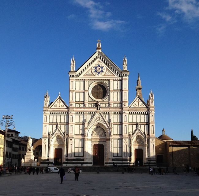 Florence: Guided Walking Tour with Entry to Santa Croce - Inside the basilica: frescoes, chapels, and the stories behind them