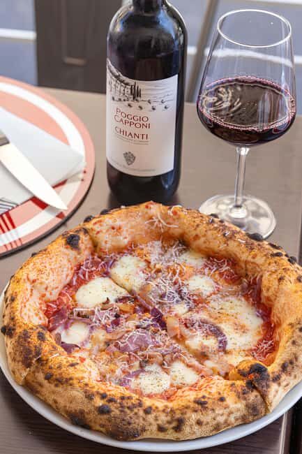 Florence: Private Pizza Making Class with Wine Tasting - Cooking Tension: Tending the Oven for Even Crust