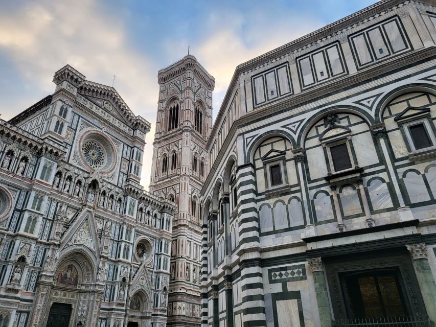 Florence: Walking Tour of Dante's Florence with a Guide - Walking the medieval streets: towers, studios, and stone-and-wood Florence