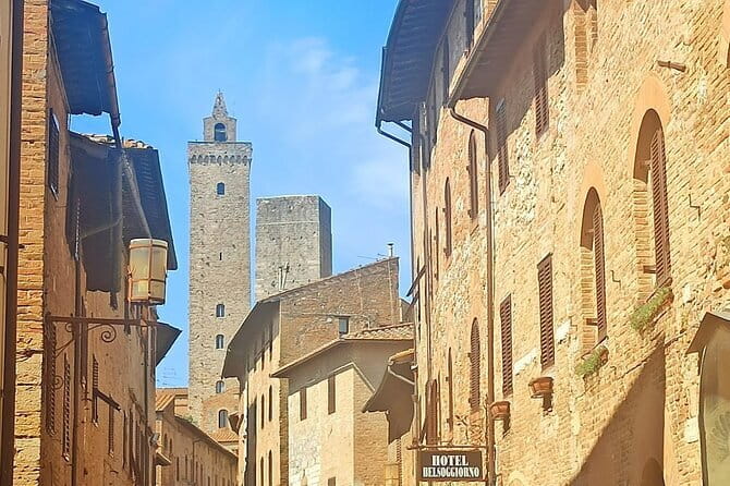 HALF-DAY: Chianti Classic Tour with Wine Experience & visit of San Gimignano - Cantine Guidi in Chianti Classico: Cellars, Five Wines, and a Real Sense of Place