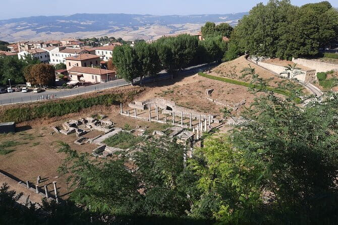 Journey Through Time in Volterra – Exclusive Private Tour - Volterra’s Timeline in a Walled, Mountaintop Town