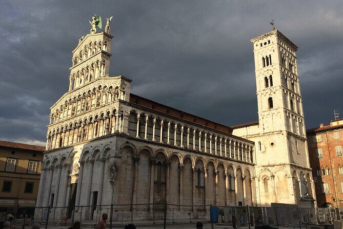 Lucca Walking Tour with Audio and Written Guide by a Local - Chiesa di San Michele in Foro: the 4-meter archangel and a glow legend