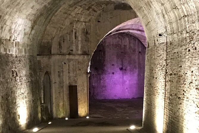 Night Walking Tour in Lucca - Piazza Anfiteatro: the elliptical shape you can feel
