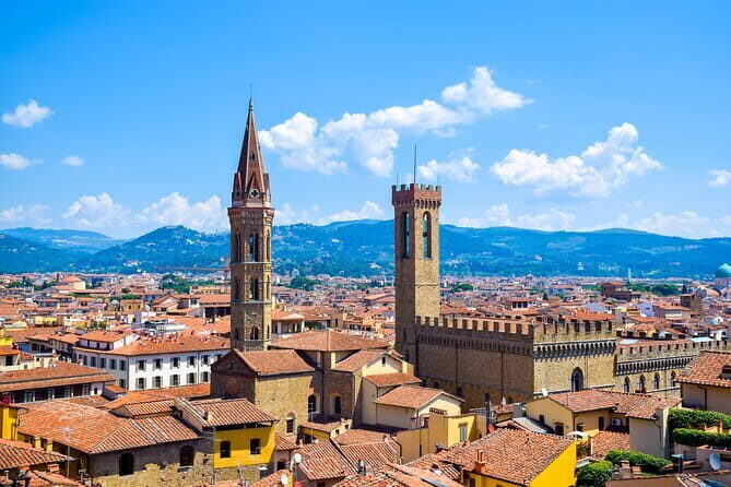 Panoramic Florence by Boat with Wine - Seeing the Uffizi, Ponte Vecchio, and the Vasari Corridor from the river