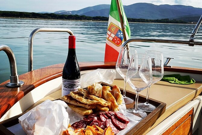 Private Boat Tour to Cala Violina and the Tuscan coast - The onboard break: cold pasta, fruit, and local white wine