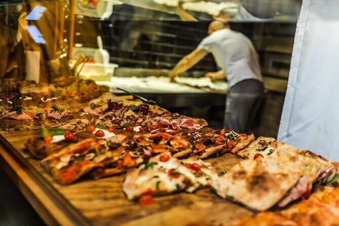 Private Local Tour Guide Bologna: Kickstart your Trip, 100% Personalized - Stop 5: Piazza spritz energy and an aperitivo stop like Tamburini