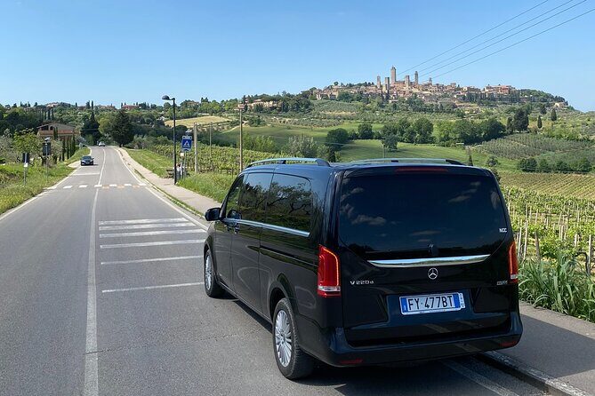 San Gimignano + Lunch&Wine private tour by van from Lucca or Pisa - Two Hours in San Gimignano’s Medieval Center