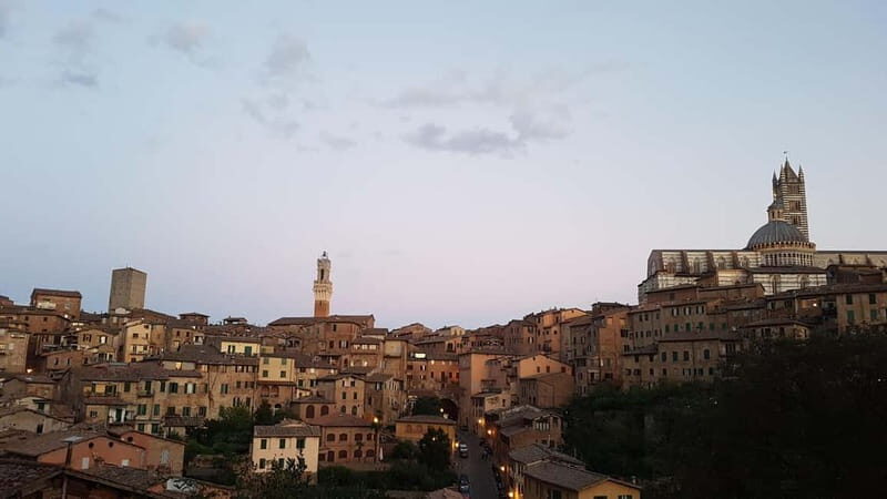 Siena: City Tour in German - Piazza del Duomo to Piazza del Campo: from the high point to the Palio stage