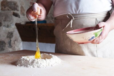 Small Group Pasta Making Class Wine Tasting in a Tuscan Castle - Estate cellars and wine context before you cook