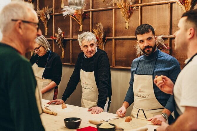 The Art of Pasta and Wine Tasting with Local Sommelier - Rolling dough with a chef who explains the why