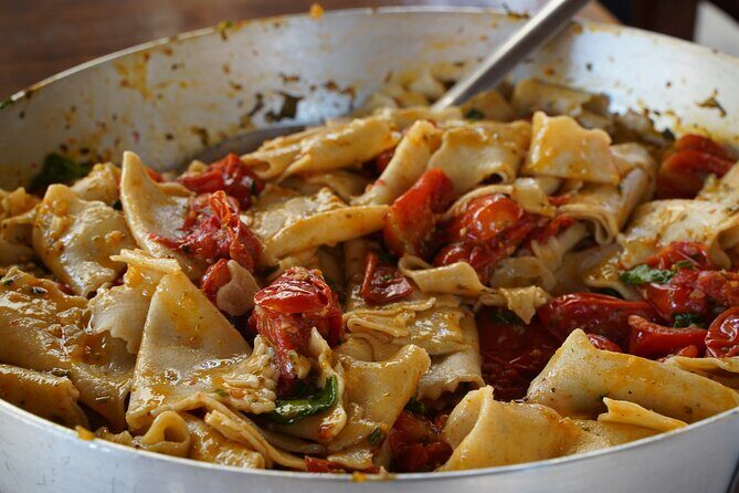 Traditional Farmhouse Cooking Experience in Lucca with Lunch or Dinner - The family table lunch or dinner: antipasto, wine, and limoncello