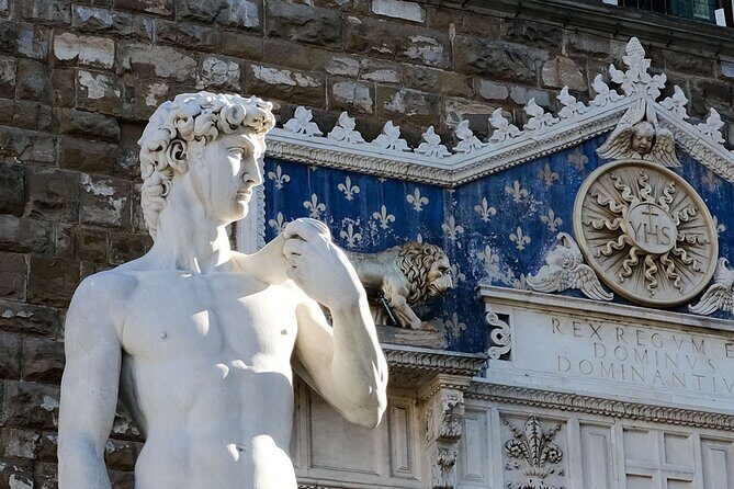 Walking Tour and Wine Experience in Florence - Passing the Uffizi on the way to the Arno: art, then views