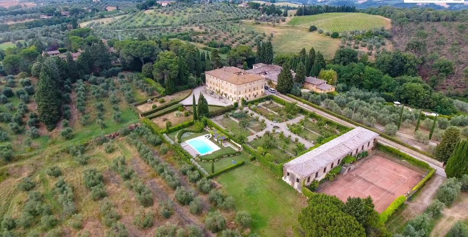 Wine Experience in an Organic Chianti Winery - Entering the historic cellar from 1810: chapel, aging rooms, and the olive mill